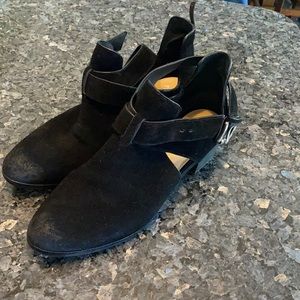 Michael Kors black boots with buckle.